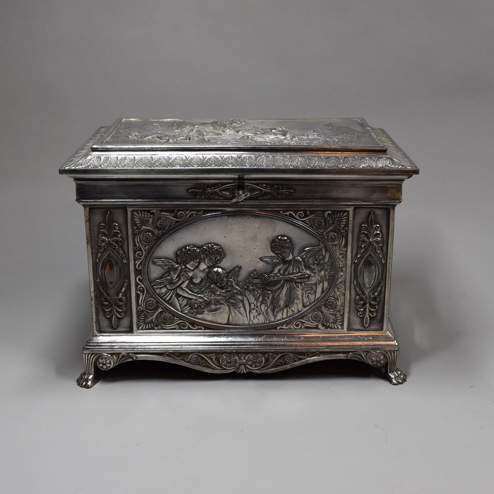 A WMF German Art Nouveau jewelry casket, circa 1905: A WMF German Art Nouveau silver plate jewelry casket, model 388 circa 1905. Fully hallmarked on the underside with WMF factory marks and embossed model number 388. Silver plated britania metal. Comes