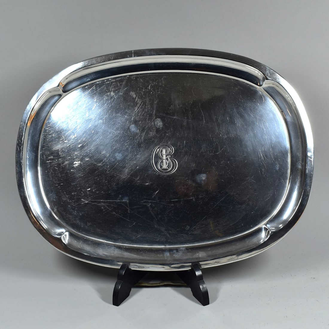 An antique / vintage CHRISTOFLE tray: An antique / vintage Christofle tray. Monogrammed. Christofle marks and numbered on the underside. Approximate measurements: 19 3/4"L x 14 3/4"W or 50cm L x 37.5cm W