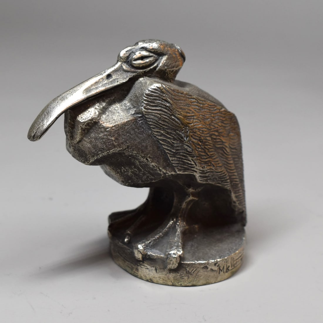 A vintage silvered bronze Pelican Hood ornament/ mascot? After MAX LE VERRIER: A vintage silvered bronze Pelican sculpture/ Hood ornament/ mascot (?) After Max Le Verrier. Signed 'Le Verrier' on the base. Approximate measurements: 4"H x 4 1/2"W x 2 1/2"D or 10cm H x 11.3cm W x 5