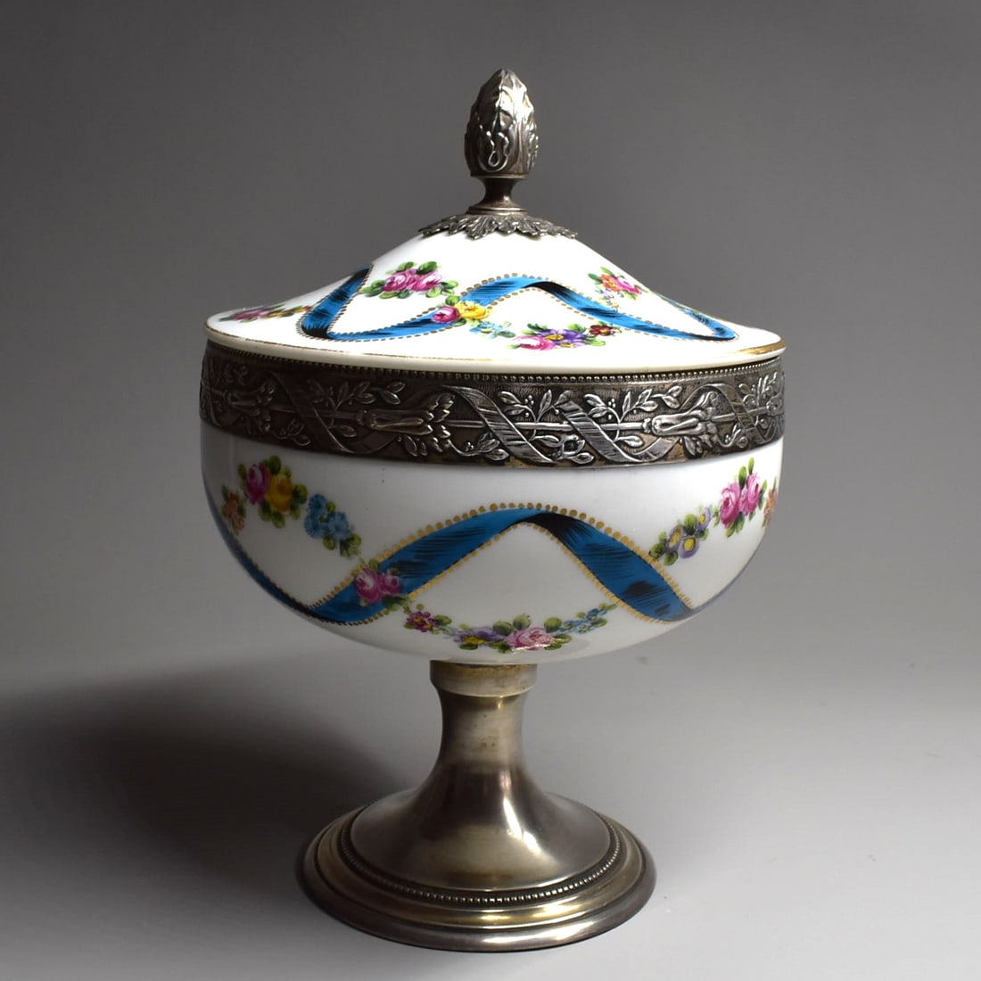 Antique French sterling silver mounted Sevres style porcelain candy dish and cover: An antique French sterling silver mounted Sevres style porcelain candy dish and cover circa 1900. The silver mounts stamped with the french high grade silver Minerva hallmark for .950 silver and an un