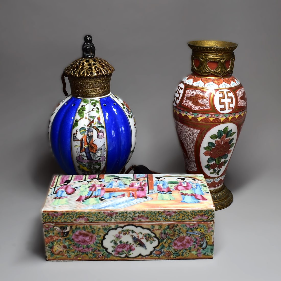 A group of miscellaneous Asian and Asian style porcelain items: A grouping of three Asian and Asian style porcelain items including a vintage Chinoiserie perfume lamp by Aerozon, Germany (9 1/2"H x 5" in diameter or 24cm H x 12.5cm in diameter), an ormolu mounted