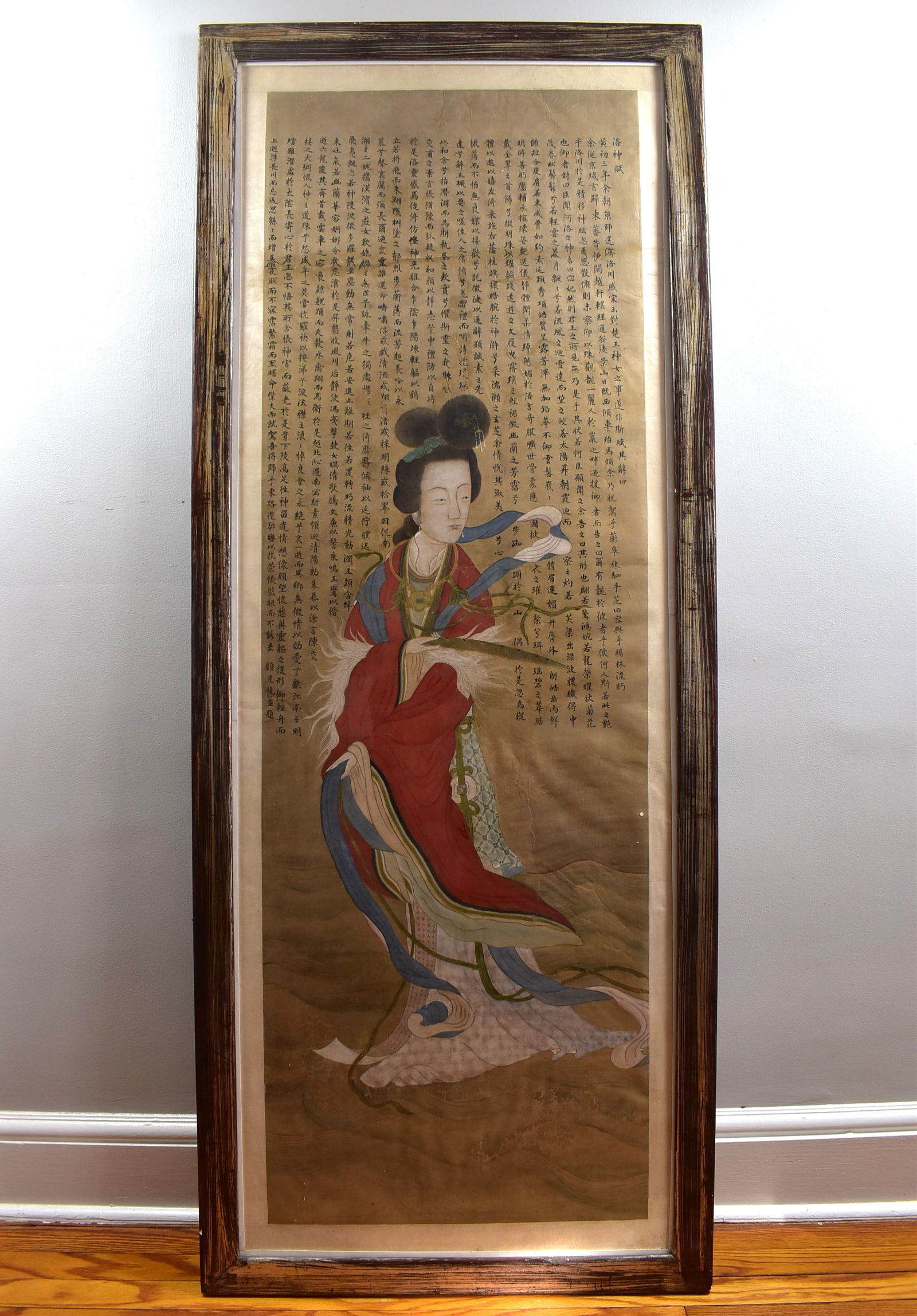 Antique Chinese scroll painting on silk with beauty and poem: An antique or vintage Chinese scroll painting on silk featuring a beauty with a poem in the background. Framed and under glass. Approximate measurements: 64"H x 25 1/2"W or 163cm H x 65cm W