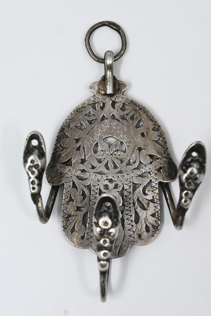 Judaica.Hamsa made of silver for keeping, Morocco, late 19th century silver, cast and engraved; (1 of 6)
