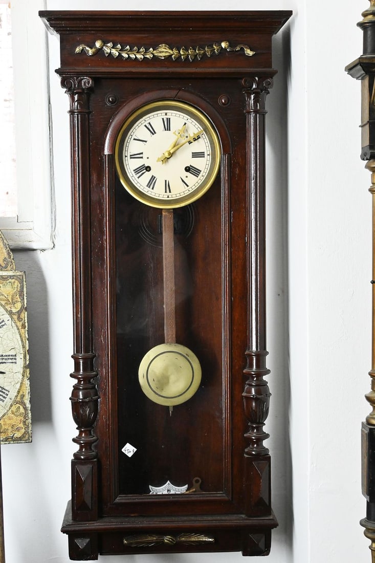 Antique wall clock, Germany, late 19th century, pendulum mechanism with key, enamel dial with Roman: Antique wall clock, Germany, late 19th century, pendulum mechanism with key, enamel dial with Roman numerals, large and impressive case carved from walnut, working condition, size: 35*95 cm, source: z