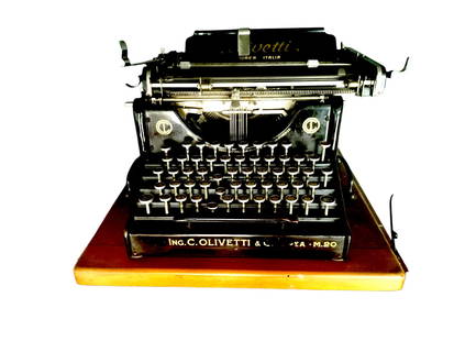 Macchina da scrivere Olivetti: Macchina del 900, periodo in cui Ferrari contrattò Olivetti come unico fornitore di macchine da scrivere per tutta l'azienda Ferrari