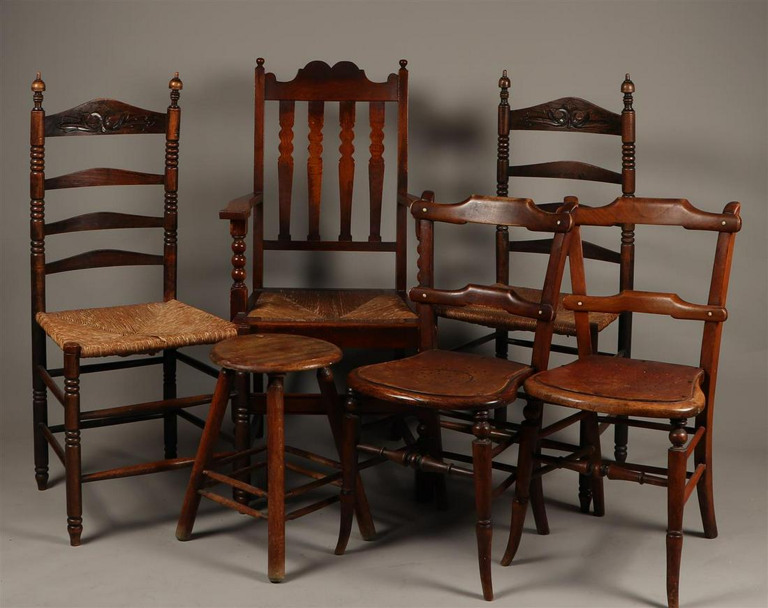 A lot consisting of various straight chairs and a stool. Va: A lot consisting of various straight chairs and a stool. Various ages.