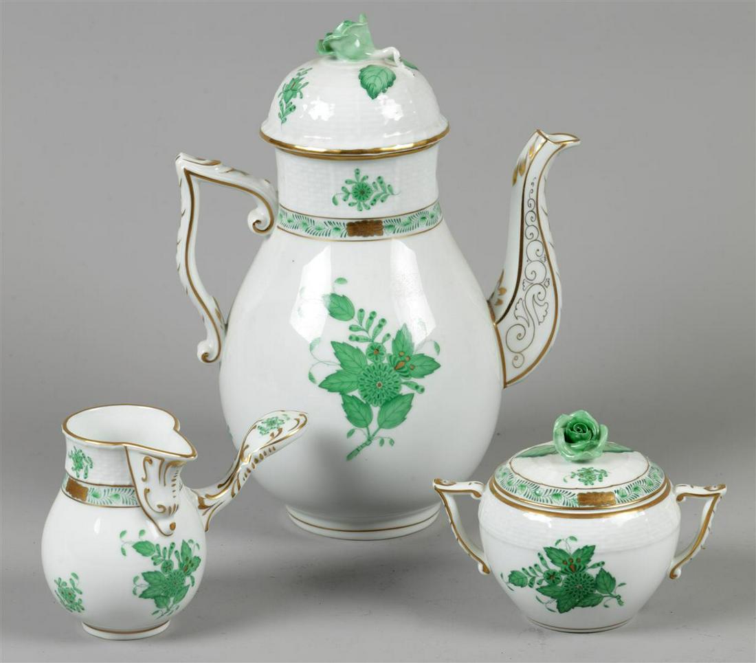 A set consisting of a porcelain coffee pot and cream set wi (1 of 1)