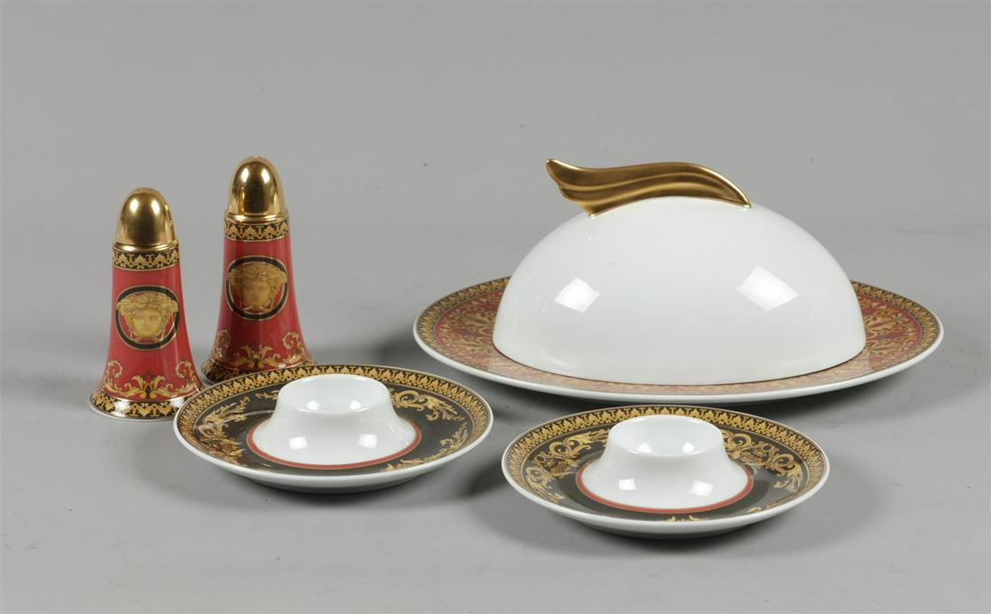 A lot of porcelain consisting of a salt and pepper set, egg: A lot of porcelain consisting of a salt and pepper set, egg cups and a cheese bell with medus decor, Rosenthal for Versace. Germany, late 20th century.