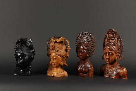 A lot of wooden busts. Bali, 20th century. H.: 26 cm.: A lot of wooden busts. Bali, 20th century.H.: 26 cm.