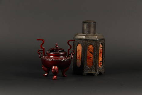 A lot consisting of a pewter tea caddy and a wooden incense: A lot consisting of a pewter tea caddy and a wooden incense burner. China, late 20th century.