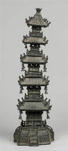 A black patinated bronze model of a Chinese pagoda. some bu: A black patinated bronze model of a Chinese pagoda. some bubbles missing. 20th century.H.: 49 cm.