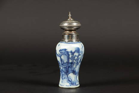 An angled porcelain shoulder vase in landscape design with: An angled porcelain shoulder vase in landscape design with silver cap frames. China, Yongzheng.H.: 13 cm.