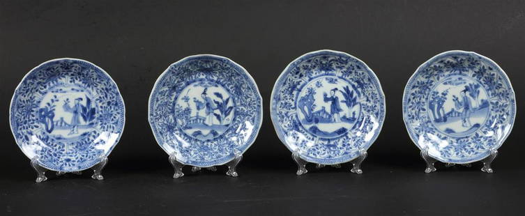 A porcelain plate with long Eliza in the center with a fenc: A porcelain plate with long Eliza in the center with a fence decor. China, Yongzheng.Diam.: 11 cm.