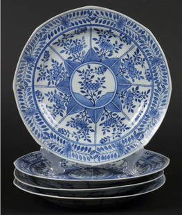 A set of porcelain plates with floral decor in sections, ma: A set of porcelain plates with floral decor in sections, marked Kangxi. China, 19th century.Diam.: 20 cm.