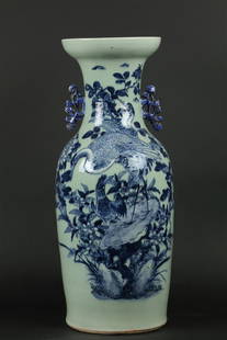 A celadon porcelain baluster vase decorated with storks. Ch: A celadon porcelain baluster vase decorated with storks. China, 19th century.H.: 58 cm.