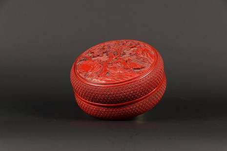 A round lacquer box decorated with figures in a landscape.: A round lacquer box decorated with figures in a landscape. China, Circa 1900.Diam.: 18 cm.