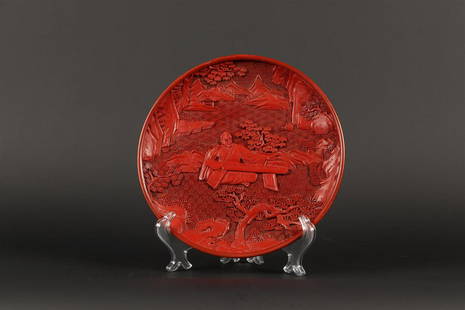 A lacquerware dish decorated with a figure in a landscape.: A lacquerware dish decorated with a figure in a landscape. China, Republic.Diam.: 25 cm.