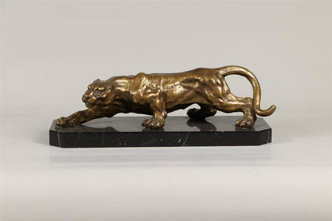 A bronze sculpture of a panther late 20th century. H.: 12: A bronze sculpture of a pantherlate 20th century. H.: 12 x L.: 42 cm.