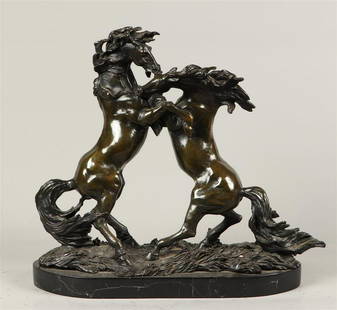 A bronze group of fighting stallions, 20th century. H.: 37: A bronze group of fighting stallions, 20th century.H.: 37 x B.: 42 cm.