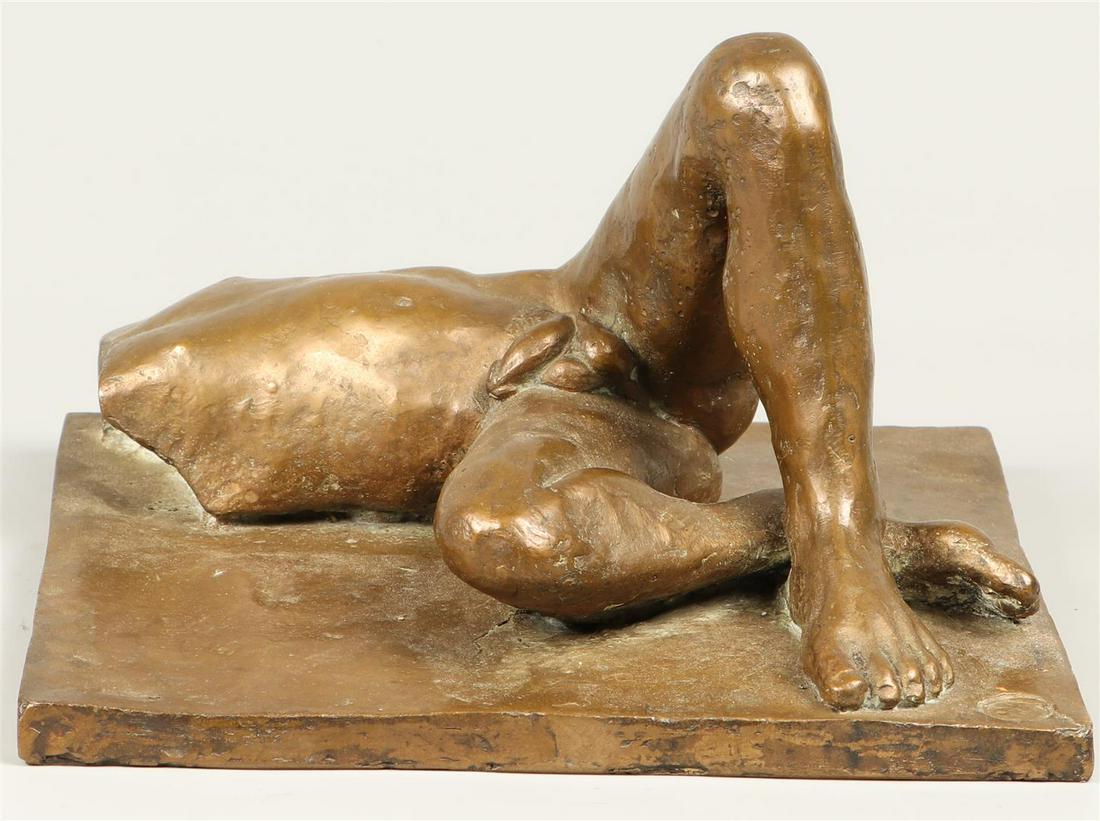 A bronze statue of a reclining male nude. 2nd half of the 2: A bronze statue of a reclining male nude. 2nd half of the 20th century.23 x 23 cm.