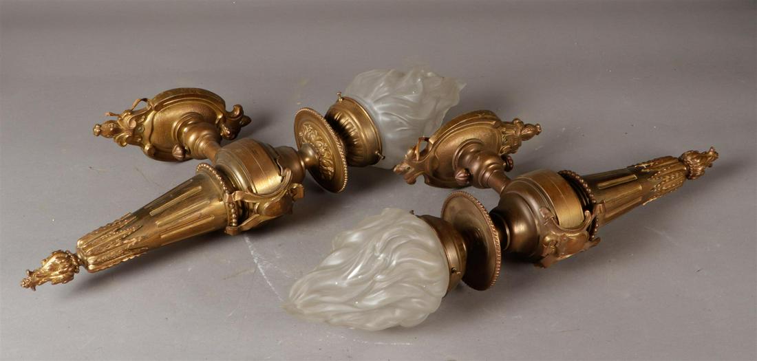 A pair of brass wall lamps with flamed glass shades. Approx (1 of 2)