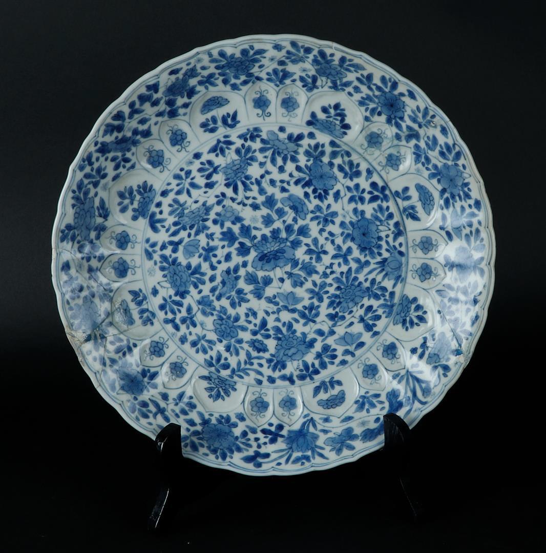 Two various porcelain plates with relief lotus leaf decor, both with floral decor. (1 of 2)