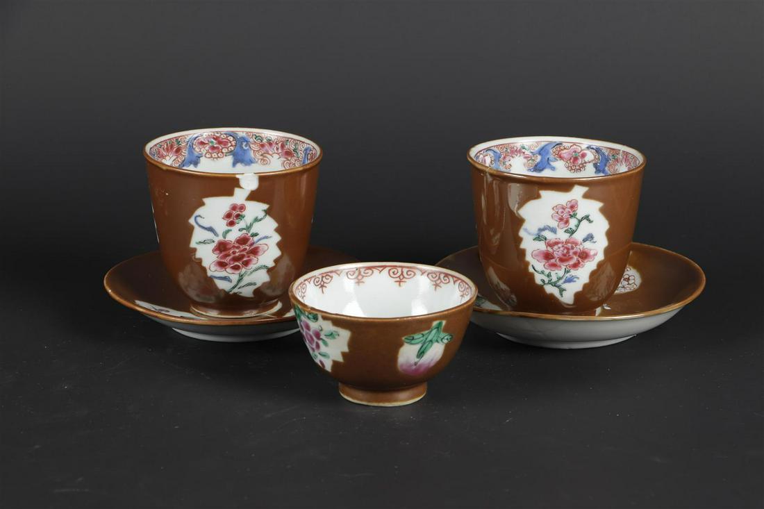 Two porcelain plates and three cups of Famille Rose with capuchin background. China, Qianlong. (1 of 5)