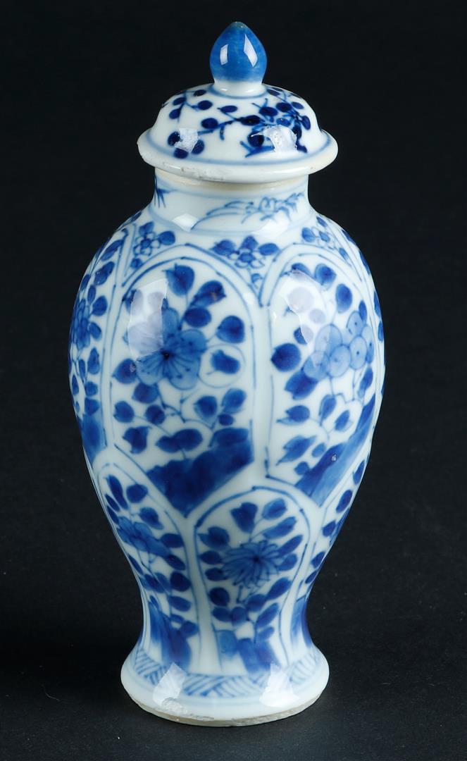 A porcelain lidded vase with lotus leaf divisions with floral decor, marked with artemisia leaf. (1 of 5)