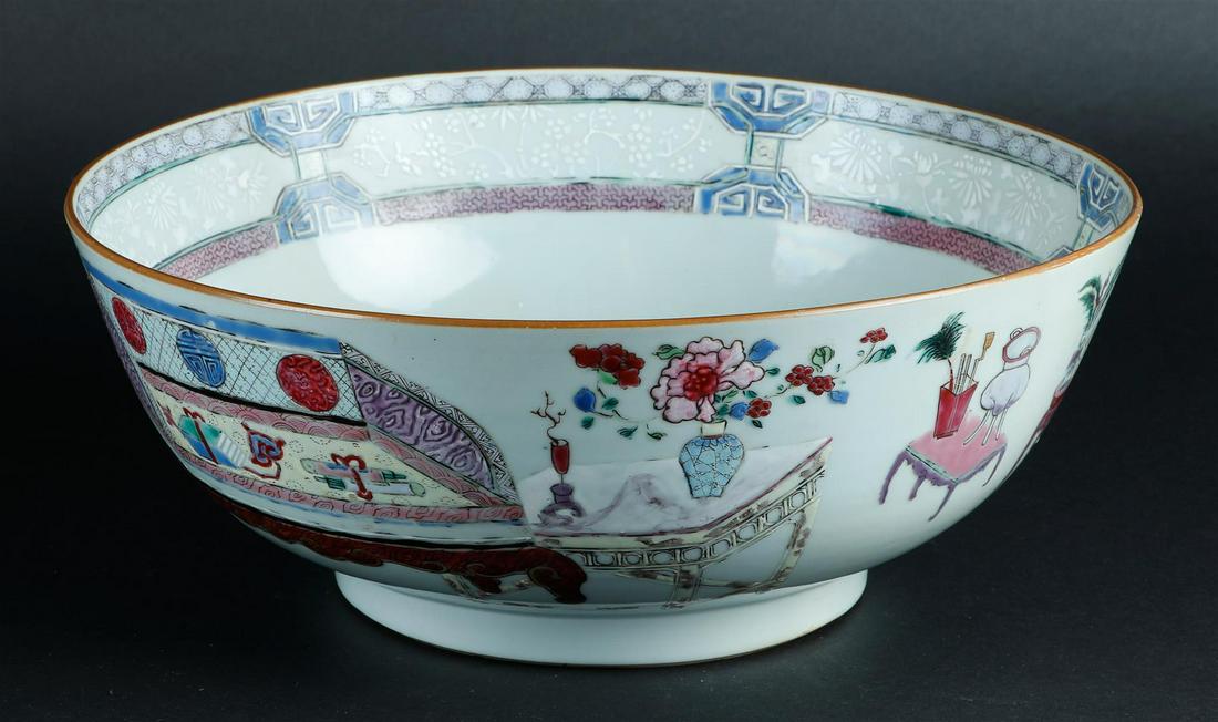 A large Famille Rose porcelain bowl decorated with various antiques. China, 18th century. (1 of 6)