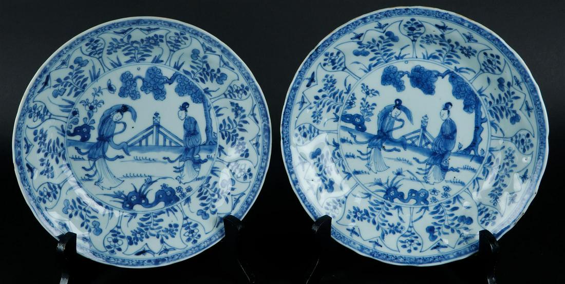 Two porcelain plates with tulip outer rim with floral decor and butterflies. (1 of 2)