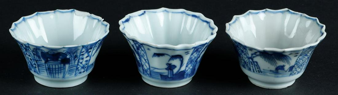 Three porcelain contoured cups and saucers with landscape and willow decor. China, Qianlong. (1 of 6)