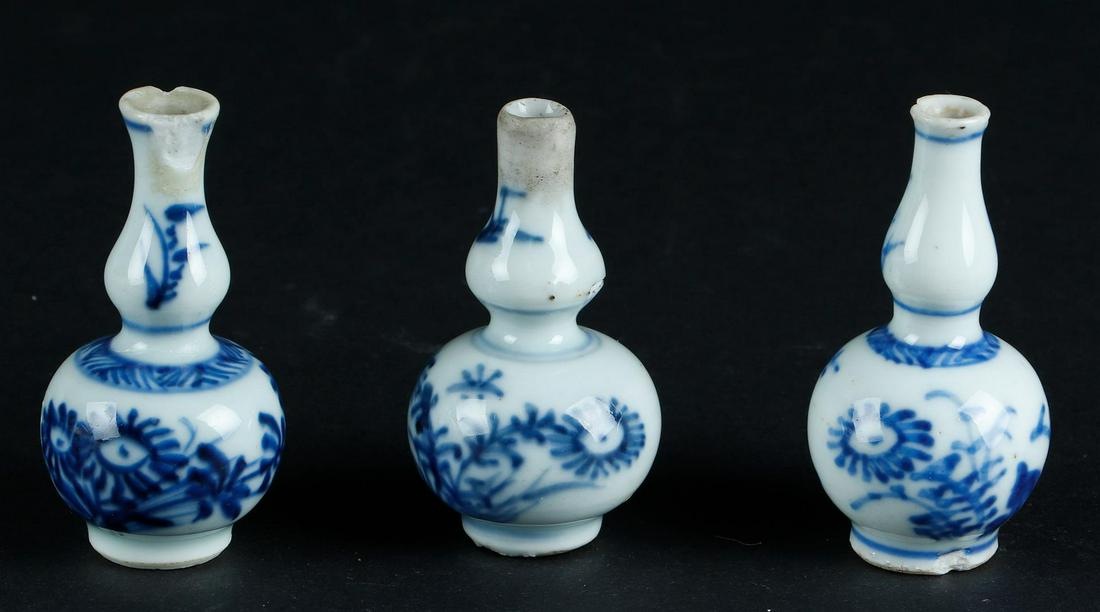 Three porcelain small model knob vases, all with floral decoration. China, Yongzheng. (1 of 3)