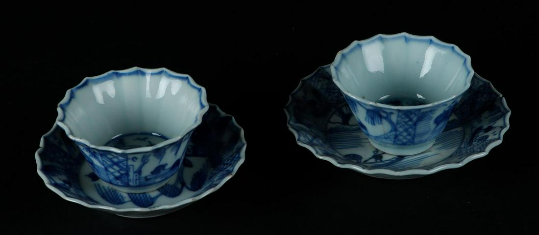 Two porcelain contoured cups and saucers with landscape decor. China, Qianlong. (1 of 3)