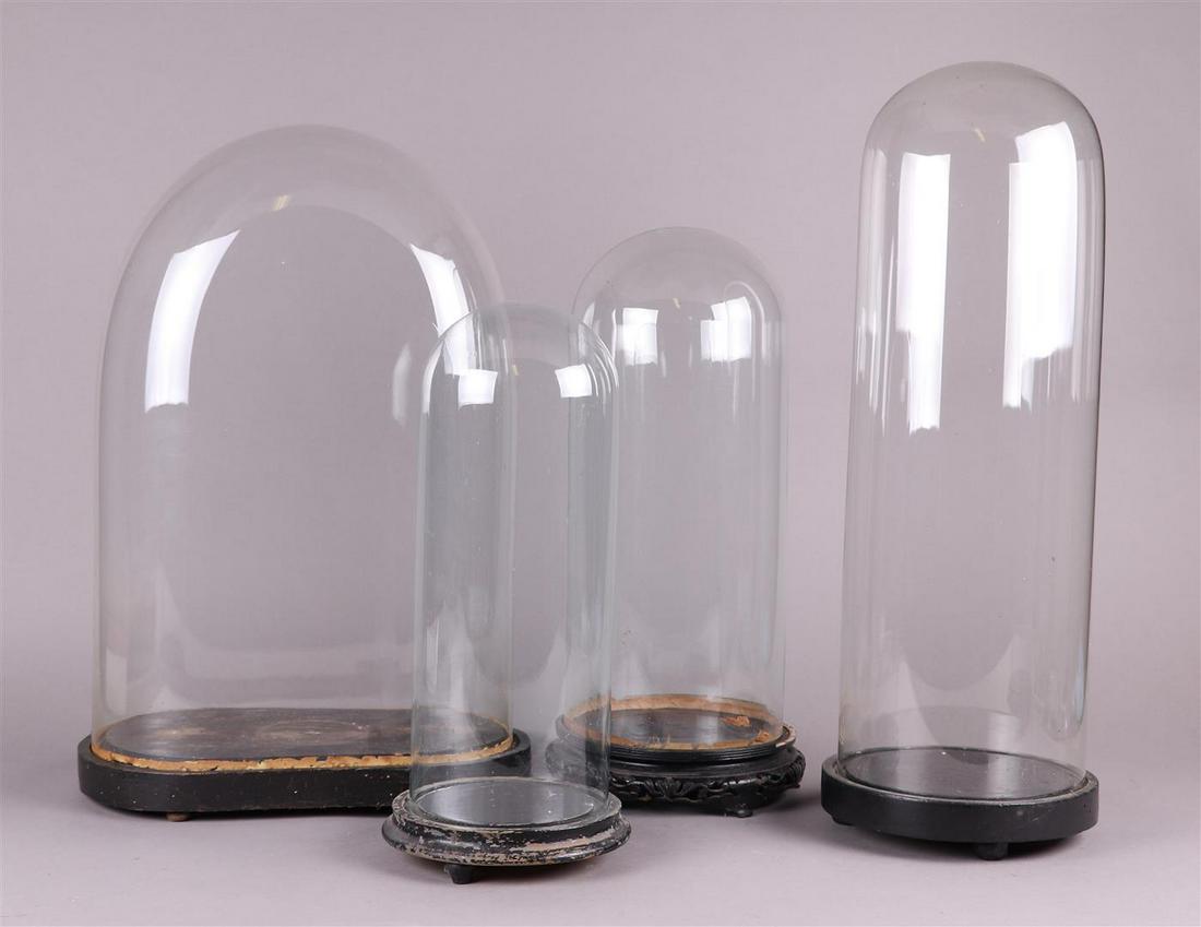 A lot with (4) various bell jars on foot, 1900 or earlier. (1 of 1)