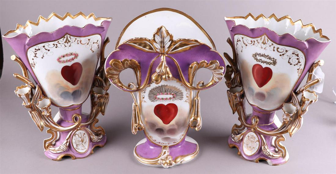 A set of three porcelain sideboard vases. France, 19th century.: A set of three porcelain sideboard vases. France, 19th century.H.: 38 cm.