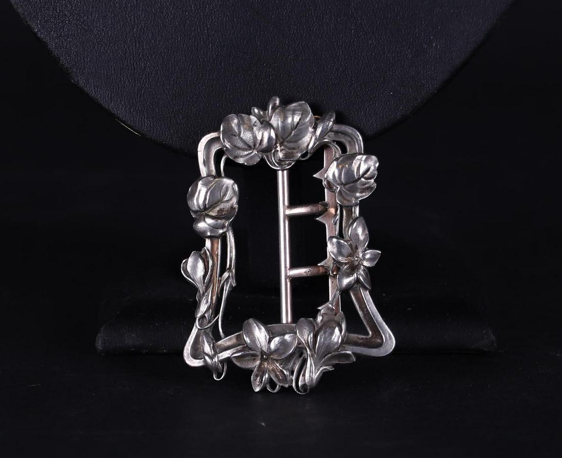 A silver Art Nouveau buckle, marked Charles Murat: A silver Art Nouveau buckle, marked Charles Murat. 29 grams.