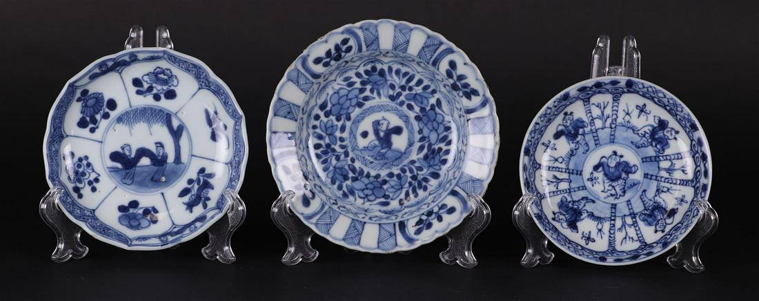 Three porcelain plates with decoration of dancing fools. China, Qianlong. (1 of 2)