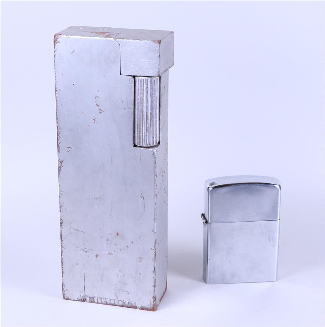 A lot of two very large decorative lighters, replicas of Zippo and Dunhil.: A lot of two very large decorative lighters, replicas of Zippo and Dunhil.H. 40 & 16 cm.