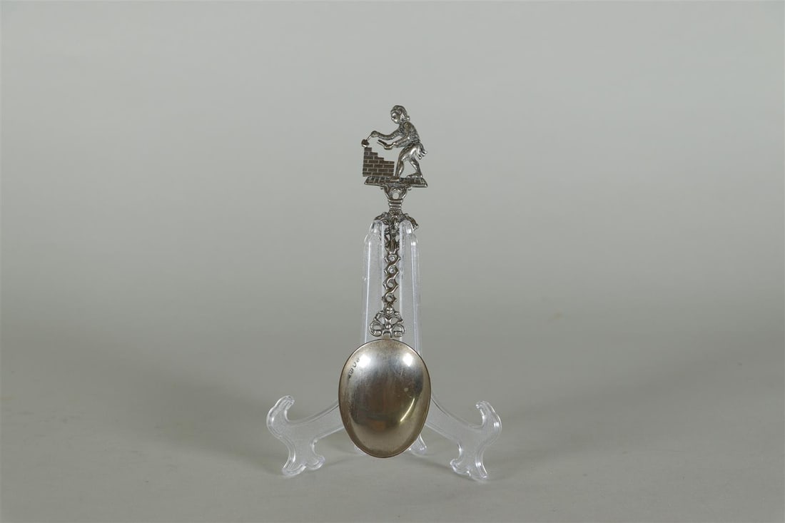A silver birth spoon. Marked in the box and annotated 'Cembureau 84'.: A silver birth spoon. Marked in the box and annotated 'Cembureau 84'.l.: 22 cm.