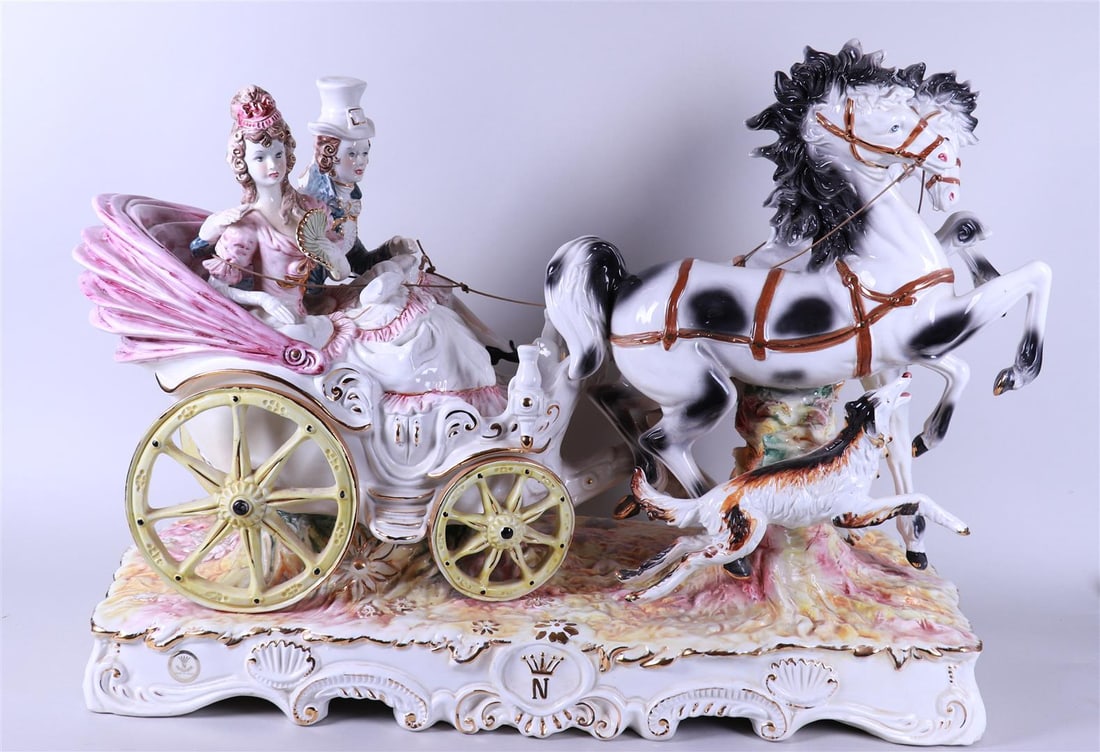 A very large earthenware statue of a carriage with horses, marked Capodimonte: A very large earthenware statue of a carriage with horses, marked Capodimonte. Italy, 20th century.60 x 80 cm.