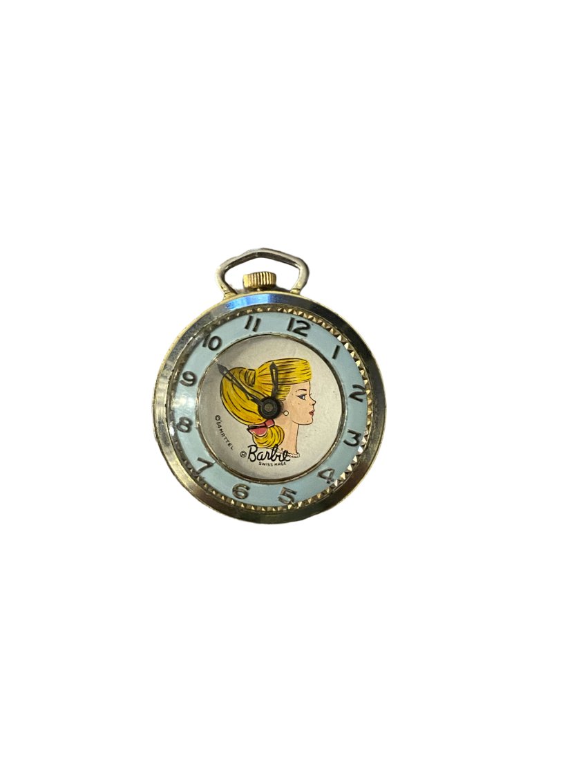 Vintage Mattel Barbie Pendant Pocket Watch: 1964 Mattel Barbie open face pendant pocket watch. Watch has not been tested and may or may not need a new battery.The size of the watch is about 1.25” or a little over a quarter size. Weight of