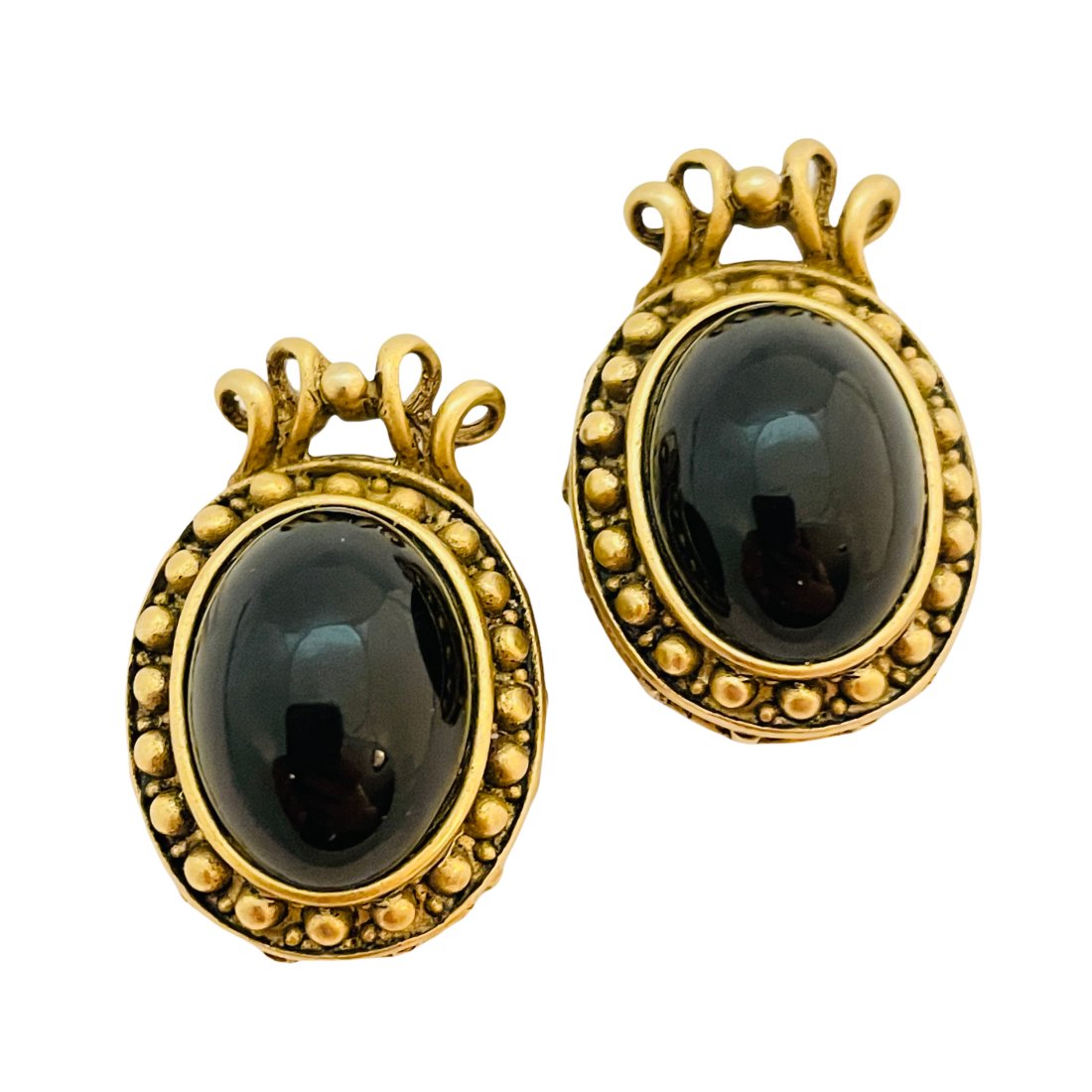 Vintage DKNY DONNA KARAN gold black designer runway clip on earrings: DETAILS• signed DKNY• gold tone with lucite• vintage designer runway earringsMEASUREMENTS• 1.25" by 0.75"CONDITION• excellent vintage condition with minimal signs of wear