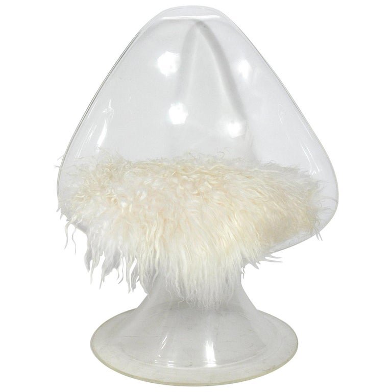 Sculptural Lucite Lily Chair by Laverne Originals Invisible Group Series: Sculptural Lucite "Lily" chair by Laverne Originals, American, circa 1960s. This lounge chair is from the Invisible Group Series and has been reupholstered with a soft cushion and sheepskin throw. Mea