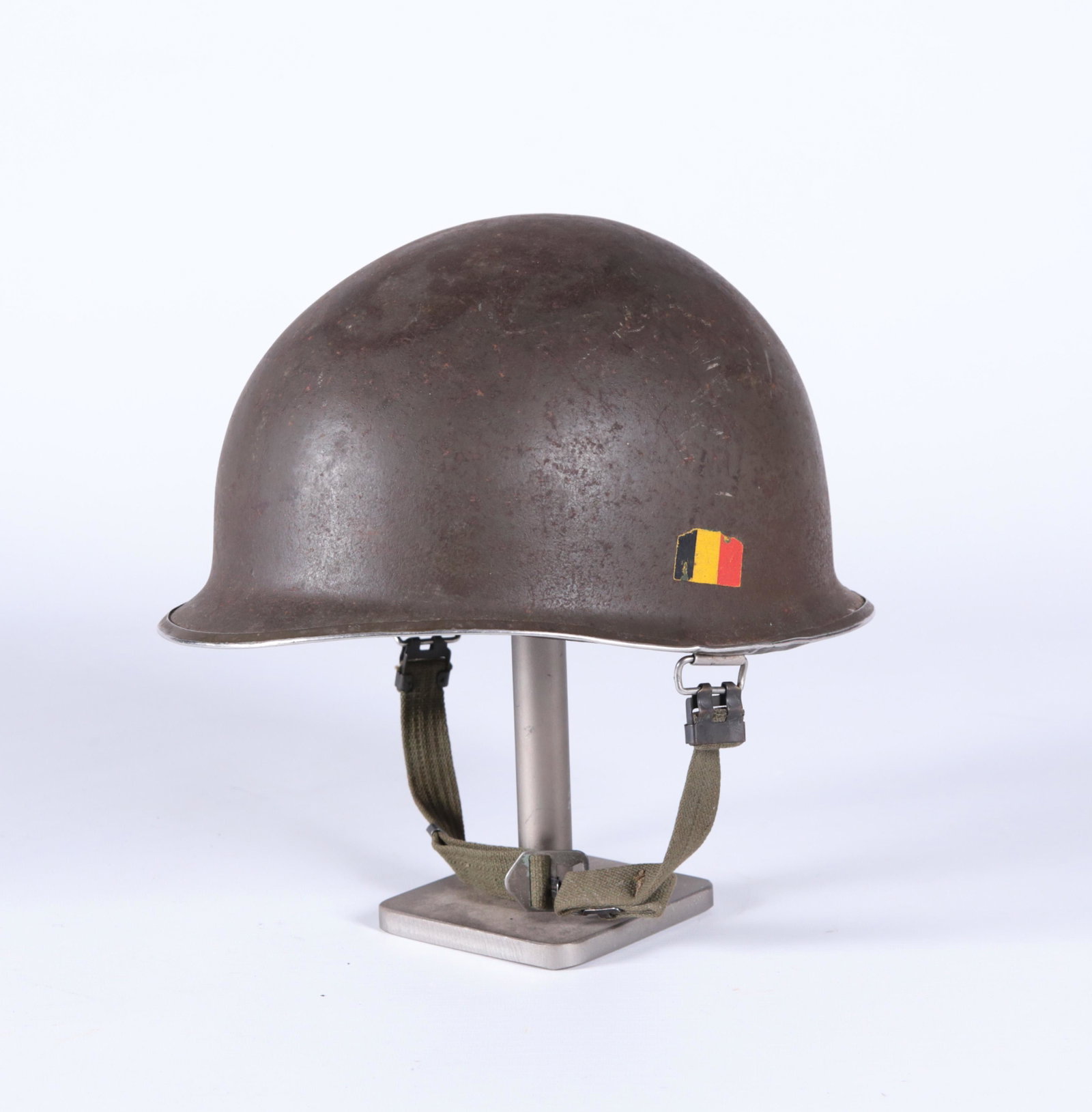 Belgian M51 Steel Combat M1 Helmet: Belgian M51 Steel Combat M1 Helmet (used)[II-]NOTEThe original US Army steel helmets, officially known as the "Helmet, Steel, M1," was first introduced in 1941 and was used by the US military until th