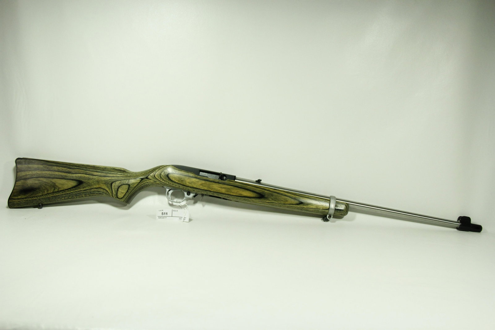 RUGER 10/22 CARBINE RIFLE .22 LR CALIBER, LAMINATED STOCK: This beautiful 10/22LR Carbine Rifle has a gorgeous ergonomically designed, warp-proof, laminated stock. Serial #233-96504