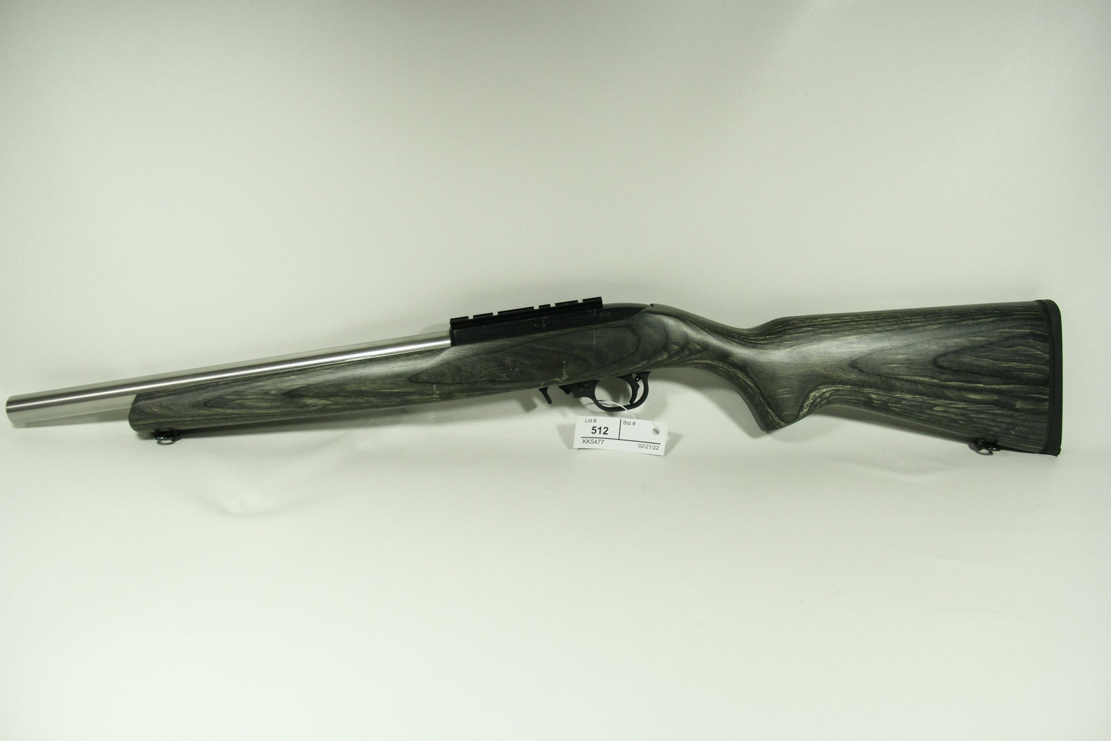 RUGER 10/22 CARBINE RIFLE .22 LR CALIBER, LAMINATED STOCK: This beautiful 10/22LR Carbine Rifle has a gorgeous ergonomically designed, warp-proof, laminated stock. Serial #246-37332