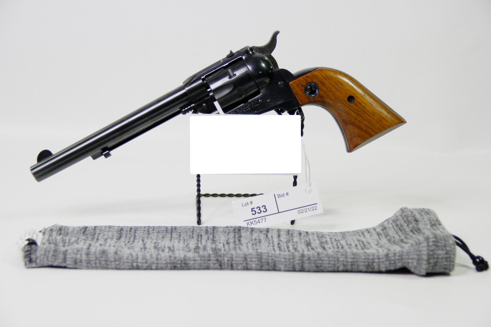 RUGER SINGLE SIX WIN..22 RF MAG. CALIBER REVOLVER: Ruger Single Six WIN..22RF MAG. Caliber single action revolver. Barrel stamped "Strum, Ruger & Co, Inc - Southport Conn. USA". Frame stamped "Ruger .22 Cal - Single-Six". Ruger wood grips. Caliber / G