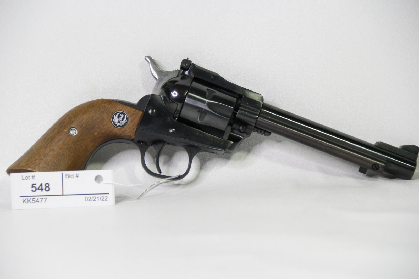 RUGER NEW MODEL SINGLE SIX .22 LR/22 CALIBER REVOLVER WMRF: Ruger New Model Single Six .22 caliber single action revolver. Barrel stamped "Strum, Ruger & Co, Inc - Southport Conn. USA". Frame stamped "Ruger .22 Cal. New Model Single-Six". Ruger wood grips. Cal