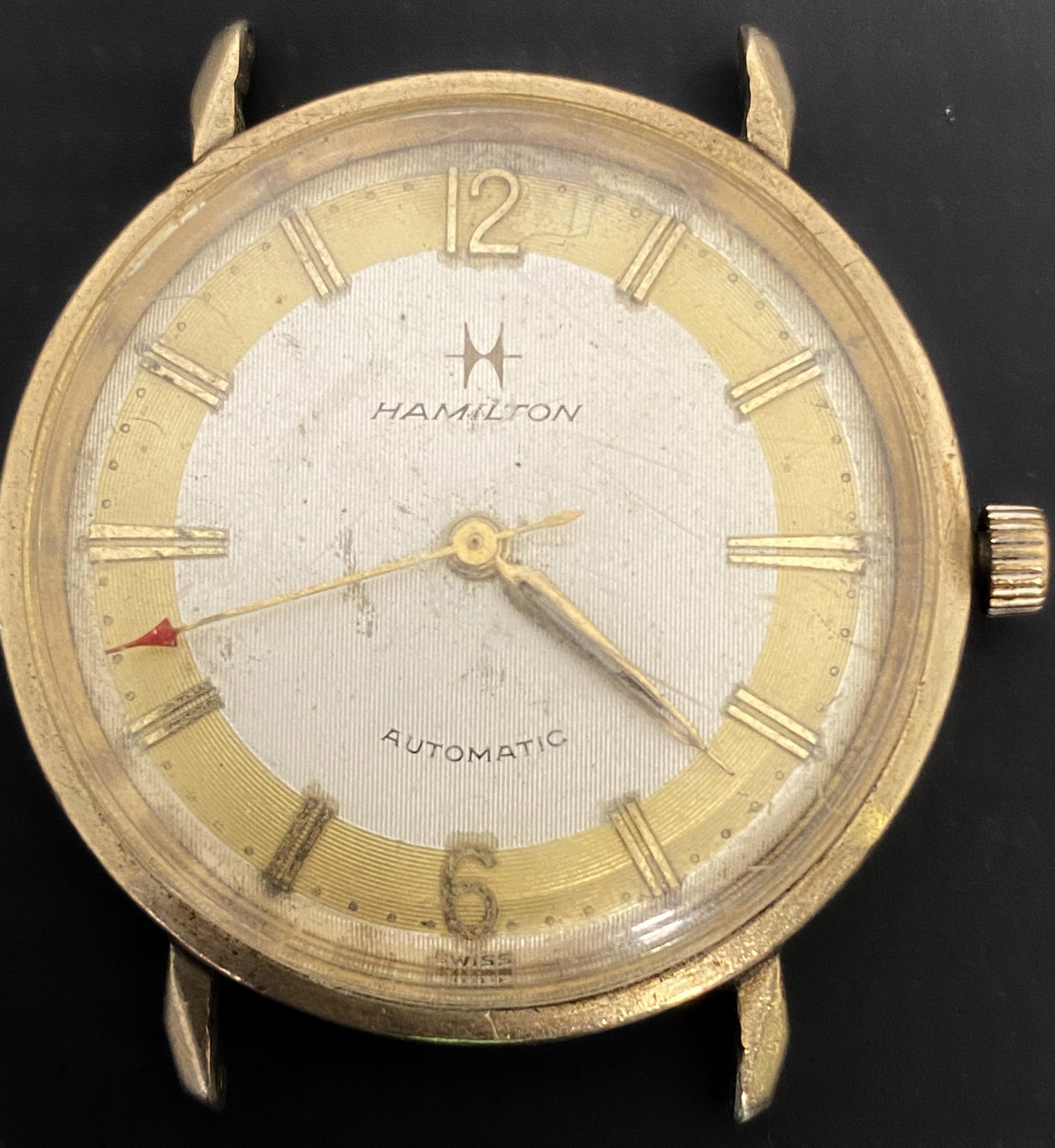 VINTAGE HAMILTON GOLD FILLED AUTOMATIC MEN'S WATCH: VINTAGE HAMILTON GOLD FILLED AUTOMATIC MEN'S WATCH The watch is pre-owned and doesn't run. Diameter: 33mm (without the crown) SHIPPING FEE CANADA 15,00$ USA 20.00$ We add 5$ by additional item
