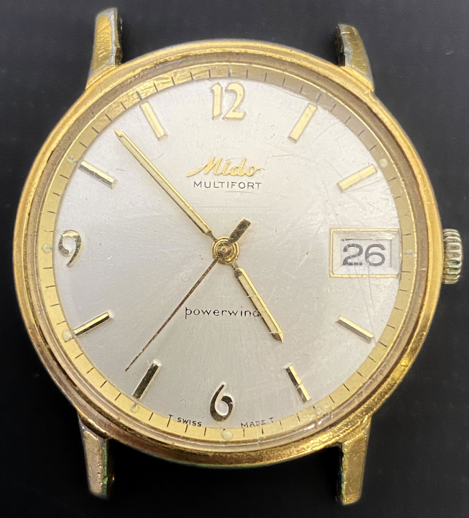 VINTAGE MIDO MULTIFORT GOLD FILLED AUTOMATIC MEN'S WATCH: VINTAGE MIDO MULTIFORT GOLD FILLED AUTOMATIC MEN'S WATCH The watch is pre-owned and runs. Diameter: 34mm (without the crown) *We can't garantee that the watch keeps accurate time, it wasn't tested lon